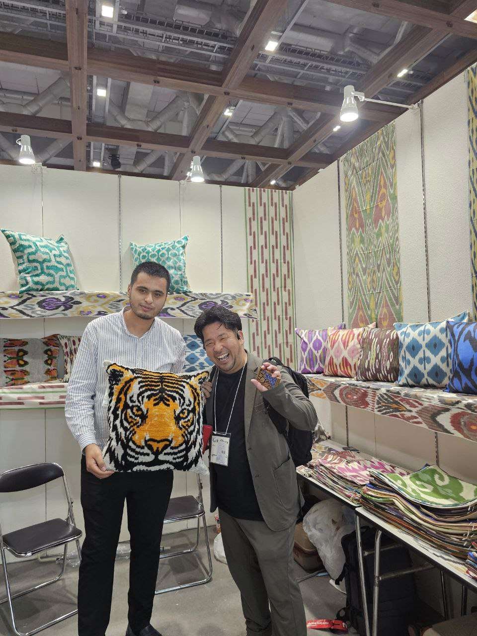 Textile partners standing in a showroom